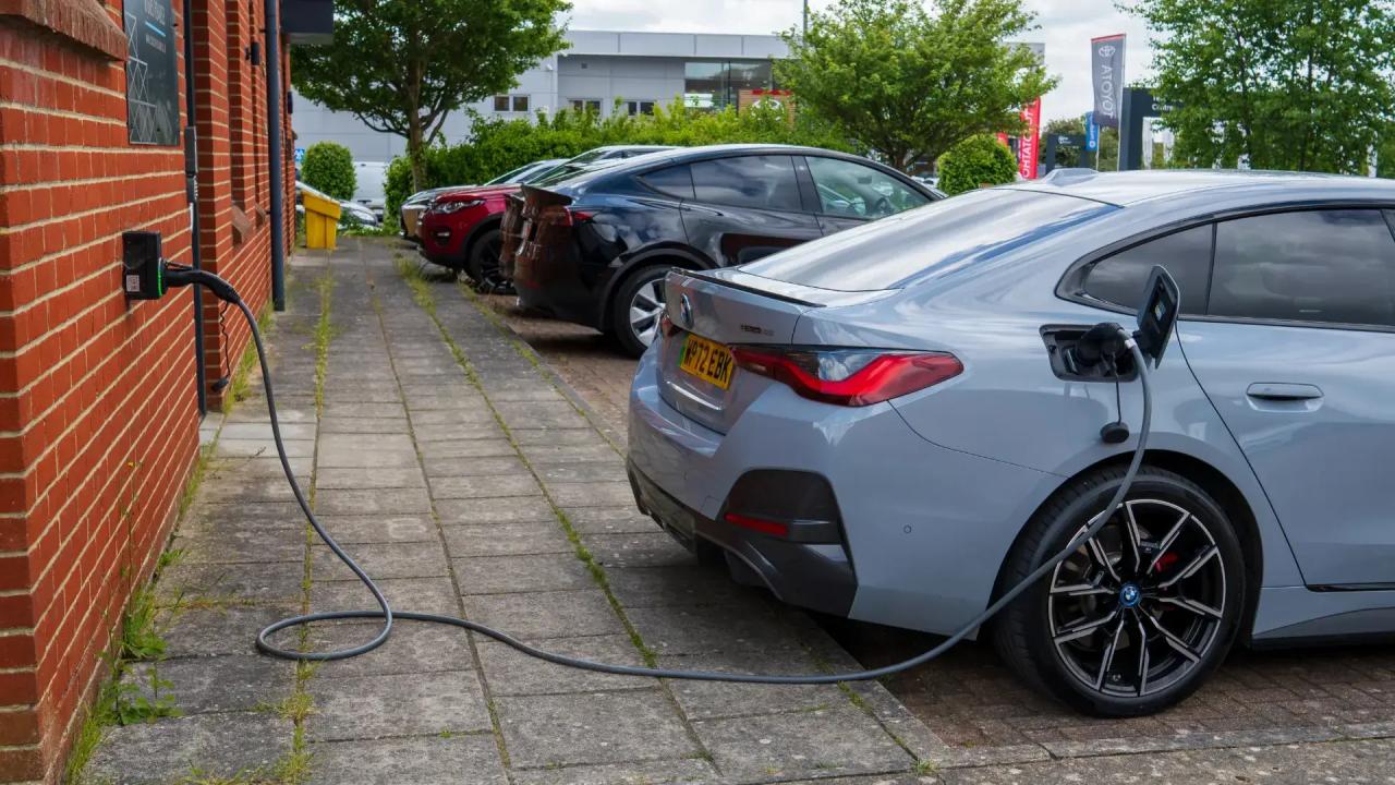 BMW hybrid being charged on the street